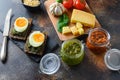 Red and green pesto and  panini bread with pesto  and eggs breakfast italy style cooking ingredients Parmesan cheese, basil Royalty Free Stock Photo