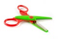 Red and green plastic scissors