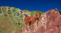 Red and green sand colors under blue sky Royalty Free Stock Photo