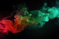 Red, green smoke black background. Color smoke. Water splash. Cosmic stardust. Royalty Free Stock Photo