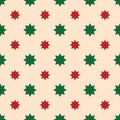 Red and Green Stars on a champagne backdrop. Simple retro geometric Christmas pattern. Traditional colors. Vector background for Royalty Free Stock Photo
