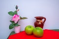 Red and green tablecloth with pears, bananas, oranges and fresh green apples Royalty Free Stock Photo