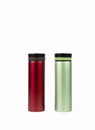 Red and green thermos bottle isolated on white background Royalty Free Stock Photo