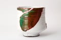 Red, green and white raku cup