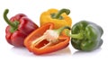 Red, green and yellow bell peppers isolated on white background