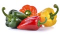 Red, green and yellow bell peppers isolated on white background