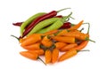 Red, green and yellow chili peppers Royalty Free Stock Photo