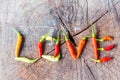 Red and greenchili pepper composed in the form of love Royalty Free Stock Photo