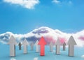 Red and grey arrows pointing up against sky Royalty Free Stock Photo