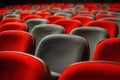 Red and grey chairs in rows Ai photo Royalty Free Stock Photo