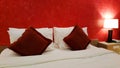 Red grunge vintage room, pillow, bed, lamp Royalty Free Stock Photo