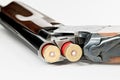 Over and Under shotgun with 12 gauge bullets in it Royalty Free Stock Photo