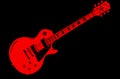 Red Guitar On Black Royalty Free Stock Photo
