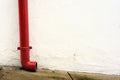 Red gutter in white wall Royalty Free Stock Photo