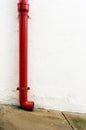 Red gutter in white wall Royalty Free Stock Photo