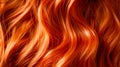 Red hair close-up as a background. Beautifully styled wavy shiny curls