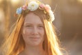 Red hair Girl Portrait in circlet of flowers Royalty Free Stock Photo