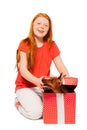 Red hair girls receive dog as present Royalty Free Stock Photo