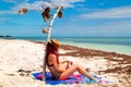 Red hair hot bikini girl resting at tropical paradise beach, Florida Keys, Bahia Honda State Park Royalty Free Stock Photo