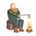 A red hair man with a beard is sitting on a stump near fire