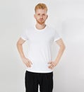 Red hair man in blank t-shirt isolated, male tshirt copy space. T shirt mock up Royalty Free Stock Photo