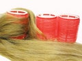 Red hair roller in hair wave Royalty Free Stock Photo