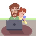 Red-haired bearded man works with a computer.