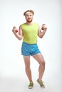 Red haired, bearded, plump man is holding the dumbbells Royalty Free Stock Photo