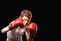 Red-haired boy with gloves Royalty Free Stock Photo