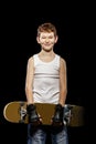 Red-haired boy with skateboard Royalty Free Stock Photo