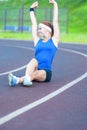 Red Haired Caucasian Sporstwoman Having Stretching Exercises