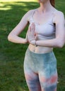 A Red-Haired Fair-Skinned Woman Practicing Yoga and Meditation in the Forest