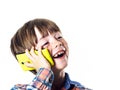 Red-haired funny boy with mobile phone Royalty Free Stock Photo