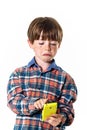 Red-haired funny boy with mobile phone Royalty Free Stock Photo