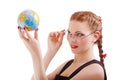 Red-haired girl with globe Royalty Free Stock Photo