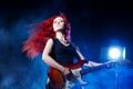 Red-haired girl the guitarist Royalty Free Stock Photo