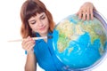 Red-haired girl is painting globe Royalty Free Stock Photo