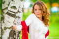 Red-haired girl in a white dress