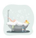 Red-haired girl in a yellow cap, lying in the bathroom, bathing. Lots of foam un bubbles