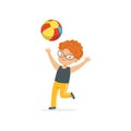 Red-haired little kid playing with colorful rubber ball in kindergarten playground. Summer outdoor activity or game