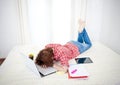 Red haired student alseep on laptop while studing