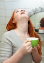 Red-haired teen girl gargling throat Royalty Free Stock Photo