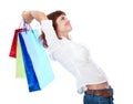 Red-haired teen-girl with three shopping bag Royalty Free Stock Photo