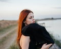 Red-haired woman black veil nature posing Royalty Free Stock Photo