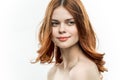 red-haired woman passionate look cropped view bare shoulders