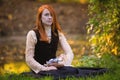 Red-haired woman in Victorian outfit Royalty Free Stock Photo