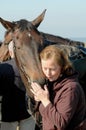 Red-haired women with horse Royalty Free Stock Photo
