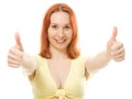 Red-haired young woman giving two thumbs up Royalty Free Stock Photo