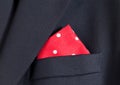 Red handkerchief in blue blazer