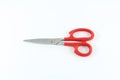 Red handle scissors in the closed position